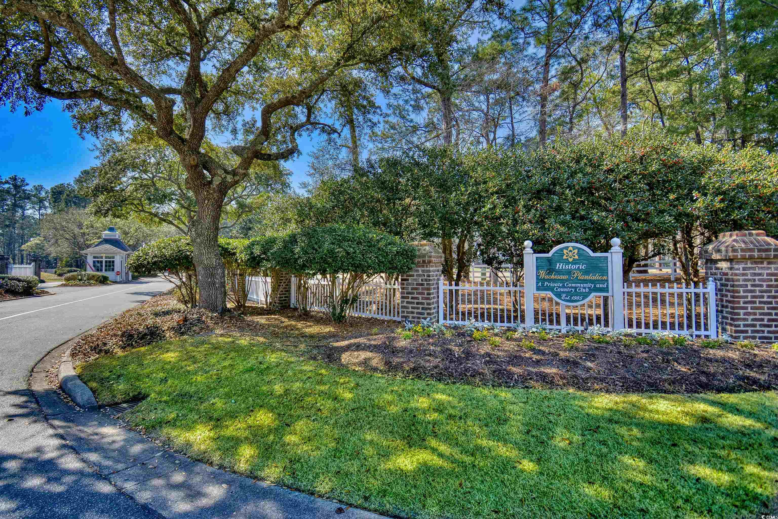 4514 Wagon Run Murrells Inlet, SC 29576 - Photo 40 of 40 Exterior space featuring a front yard, fence, and