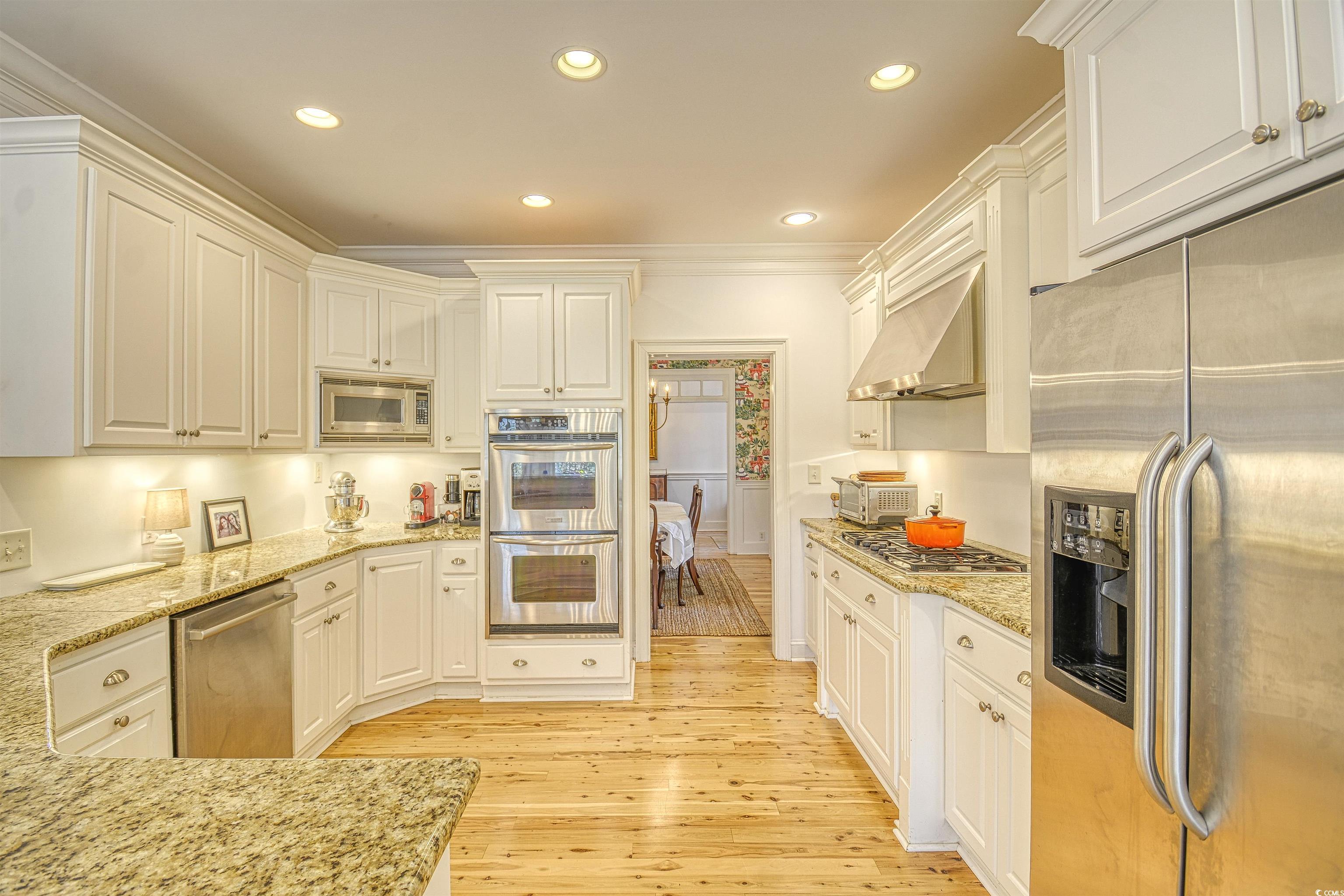 4514 Wagon Run Murrells Inlet, SC 29576 - Photo 7 of 40 Kitchen with light stone counters, recessed lighti