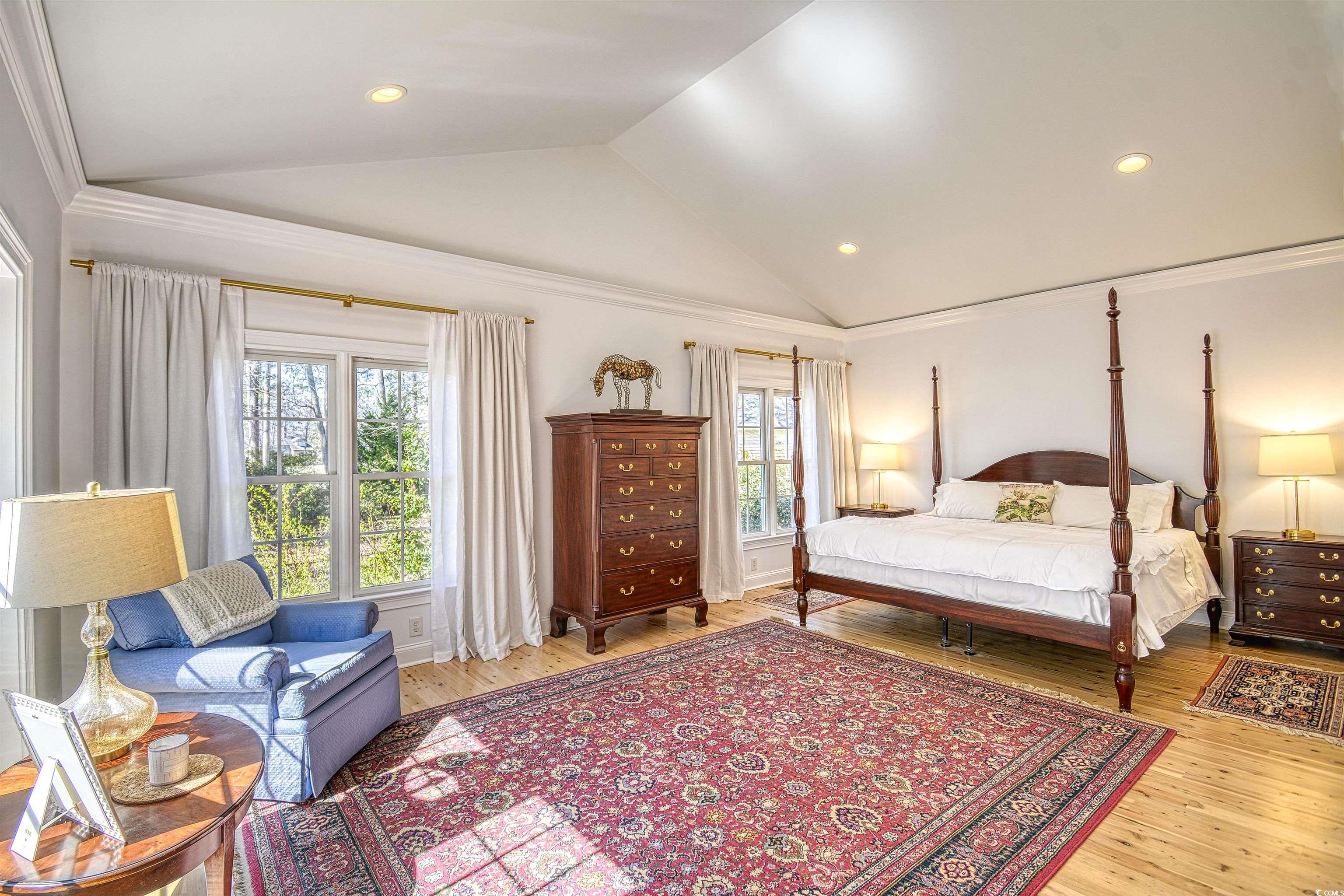 4514 Wagon Run Murrells Inlet, SC 29576 - Photo 10 of 40 Bedroom with vaulted ceiling, wood finished floors