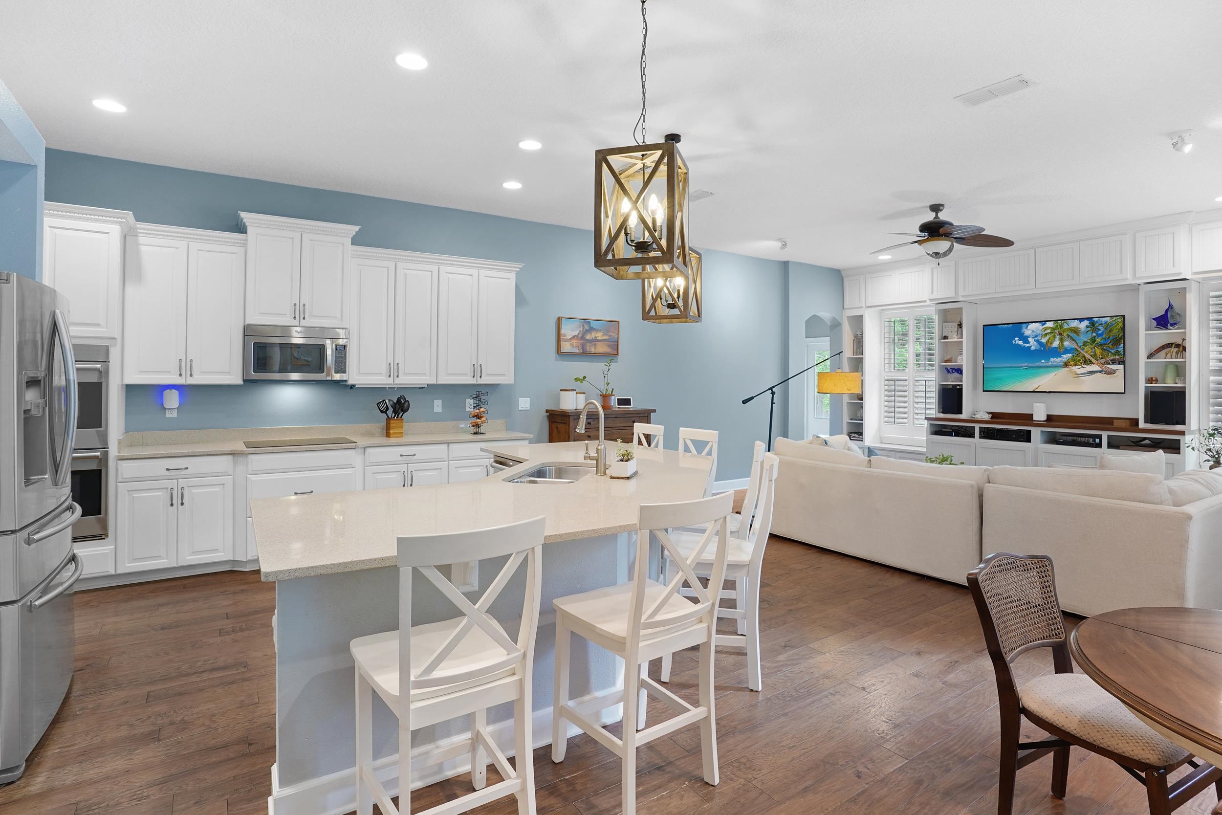 1308 Acorn Ridge Court St. Augustine, FL 32092 - Photo 9 of 47 a large kitchen with a table and chairs