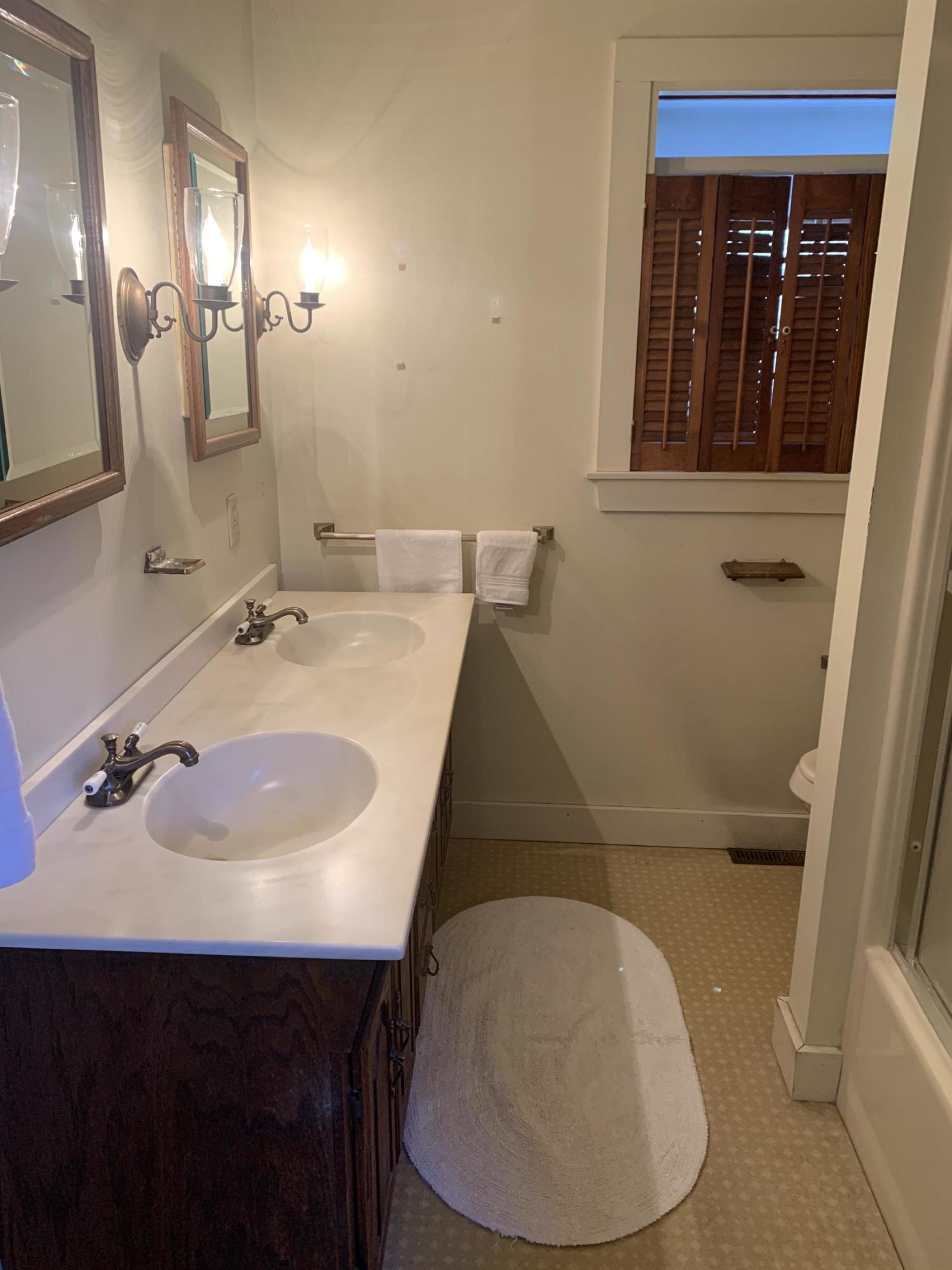 150 Browns Neck Road Wellfleet, MA 02667 - Photo 12 of 30 a bathroom with a sink and a mirror