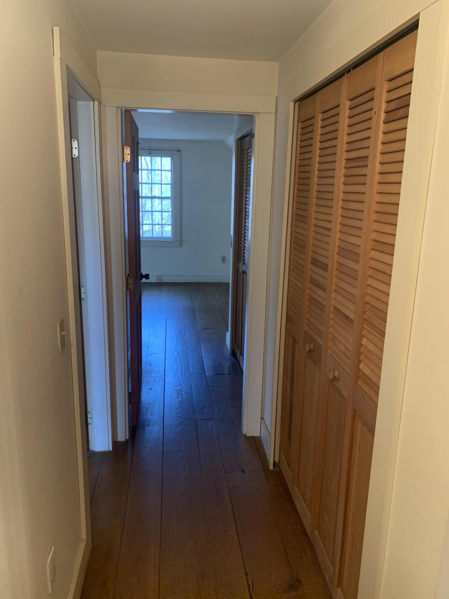 150 Browns Neck Road Wellfleet, MA 02667 - Photo 21 of 30 a view of hallway with wooden floor