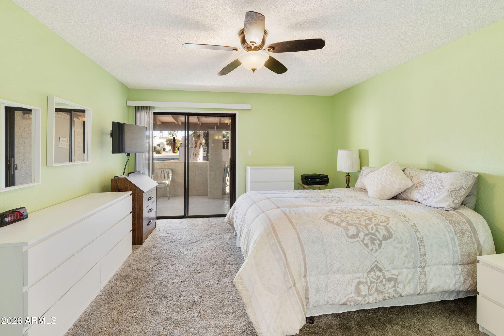 503 South Boojum Way Mesa, AZ 85208 - Photo 14 of 51 a spacious bedroom with a bed and a ceiling fan