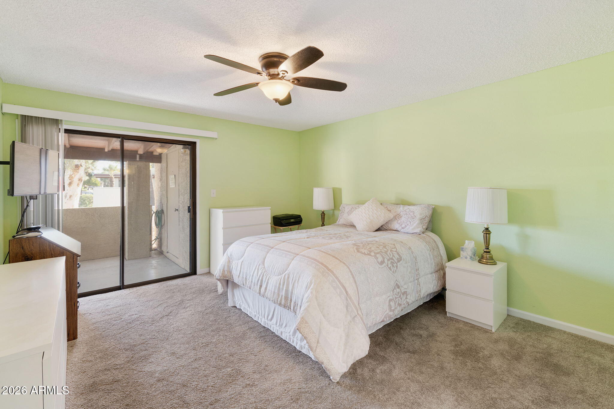 503 South Boojum Way Mesa, AZ 85208 - Photo 15 of 51 a bedroom with a bed and a chandelier