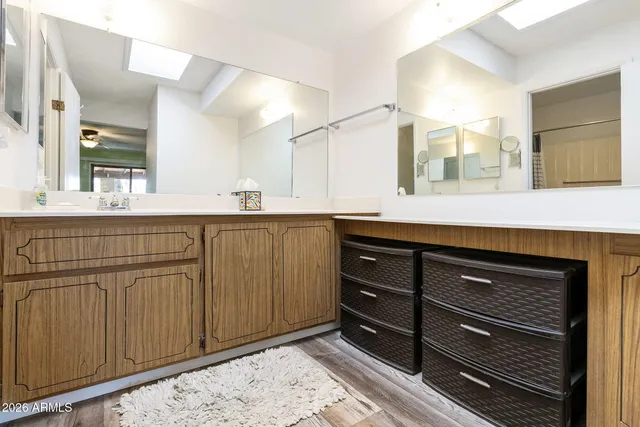 a kitchen with a sink and cabinets