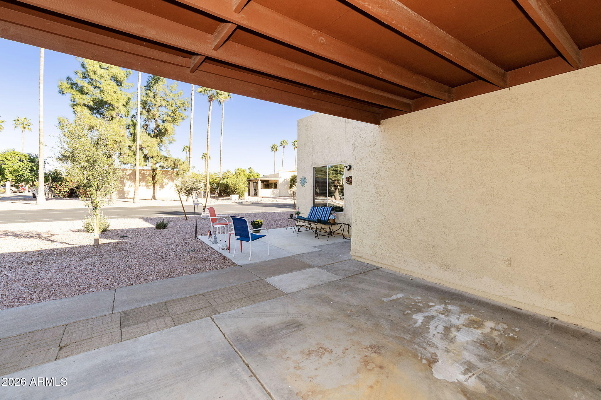 503 South Boojum Way Mesa, AZ 85208 - Photo 26 of 51 a building outdoor space with patio furniture and potted plants