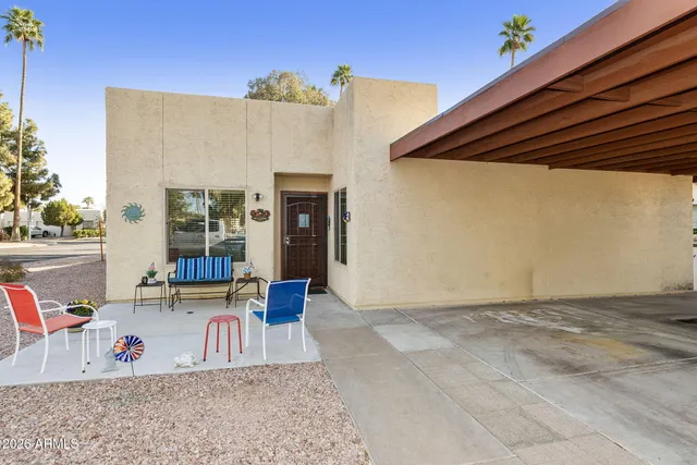 a workspace with furniture and a window