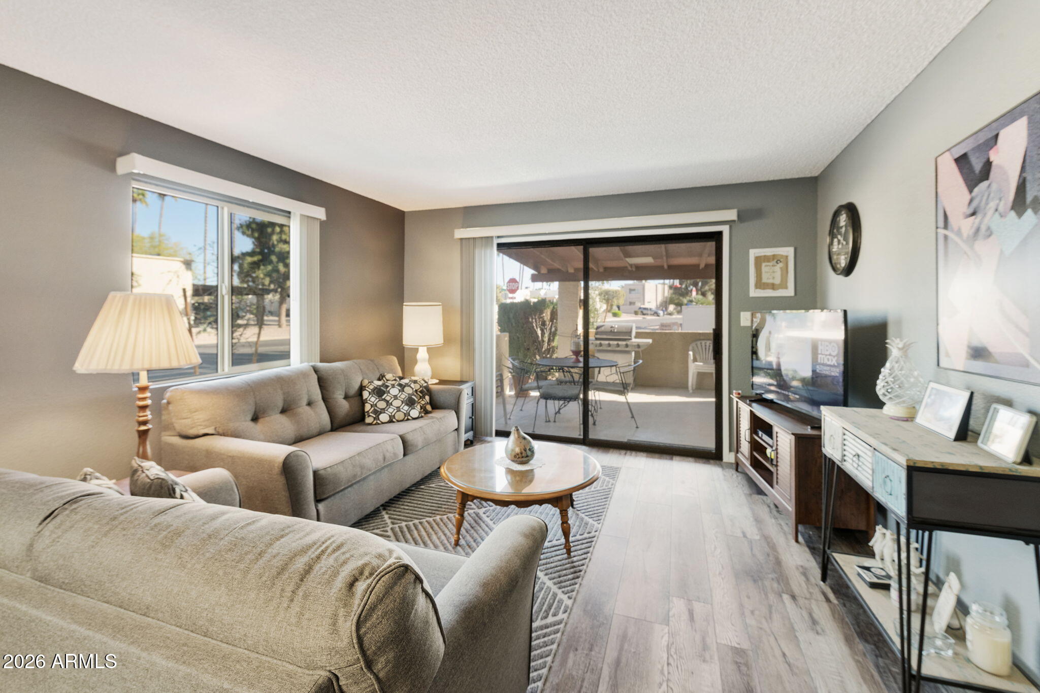 503 South Boojum Way Mesa, AZ 85208 - Photo 4 of 51 a living room with furniture and a flat screen tv