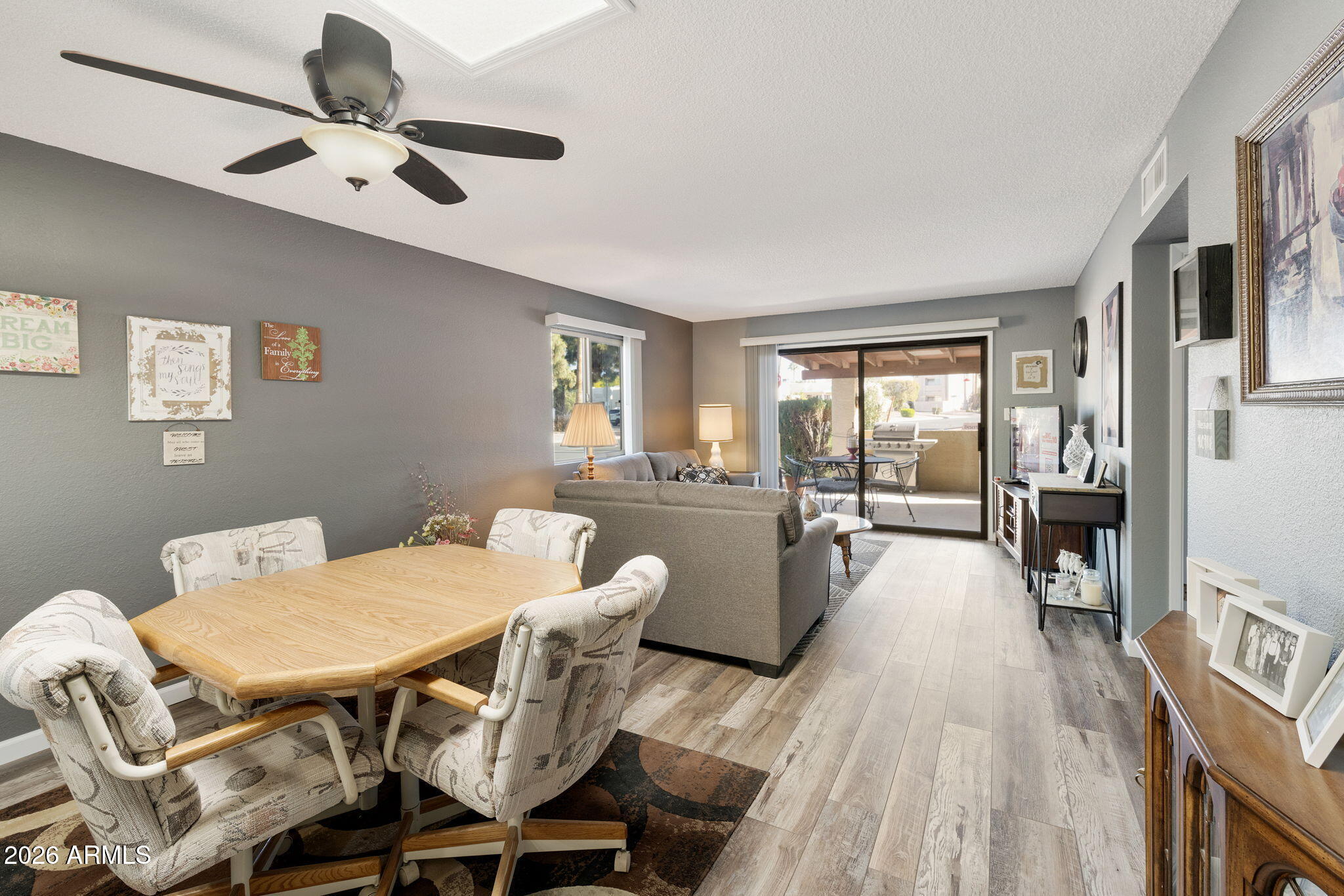 503 South Boojum Way Mesa, AZ 85208 - Photo 5 of 51 a view of a dining room with furniture window and wooden floor