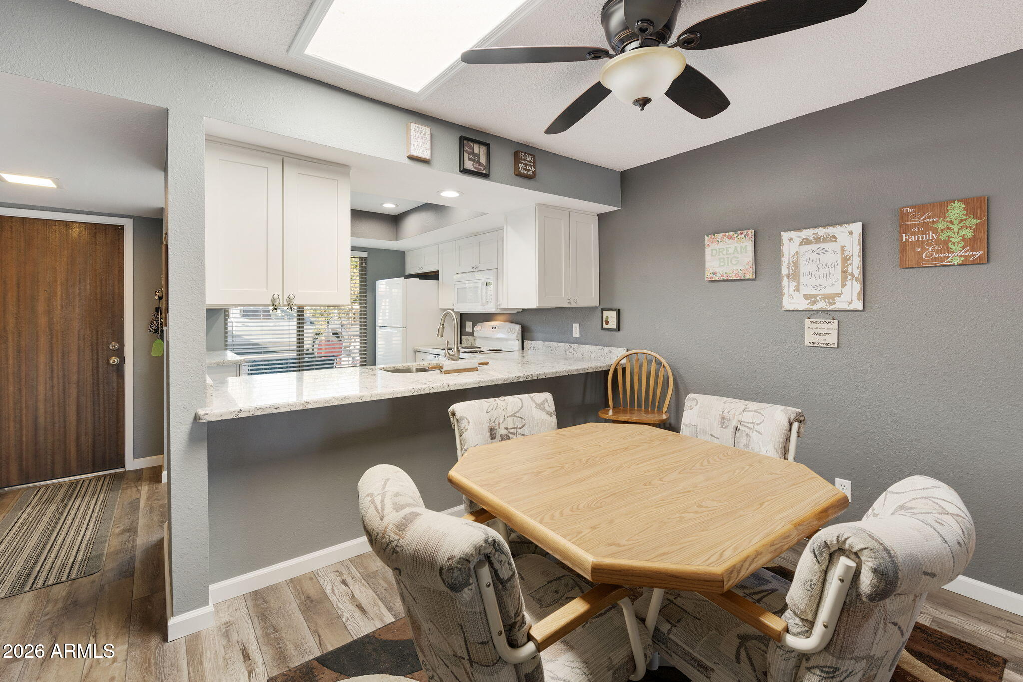 503 South Boojum Way Mesa, AZ 85208 - Photo 6 of 51 a dining room with furniture and window