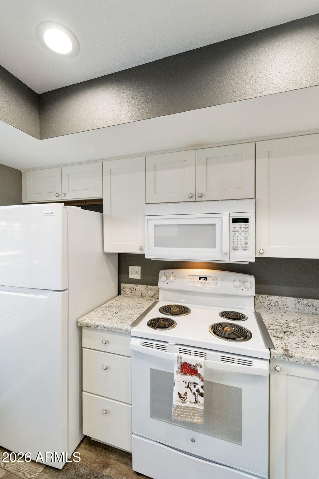 503 South Boojum Way Mesa, AZ 85208 - Photo 10 of 51 a white stove top oven sitting inside of a kitchen