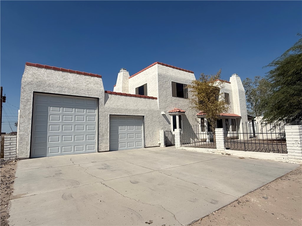 1645 Dunlap Road Fort Mohave, AZ 86426 - Photo 1 of 39 a view of the house with a street