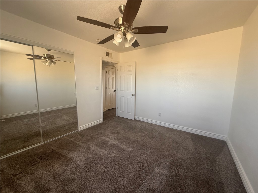 1645 Dunlap Road Fort Mohave, AZ 86426 - Photo 10 of 39 a view of a room with a ceiling fan