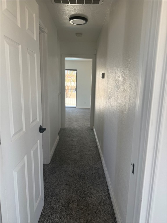 1645 Dunlap Road Fort Mohave, AZ 86426 - Photo 16 of 39 a view of a hallway with a wooden door