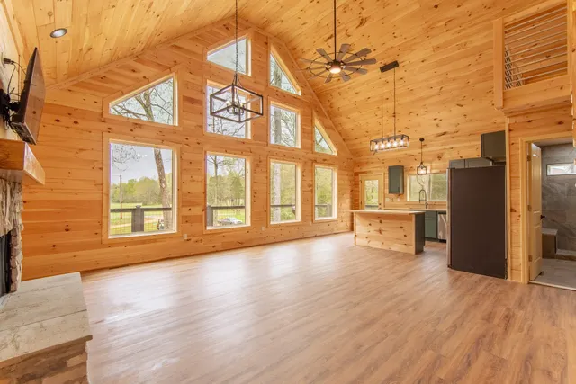 a view of a living room with a large window