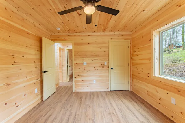 a bathroom with a tub and shower