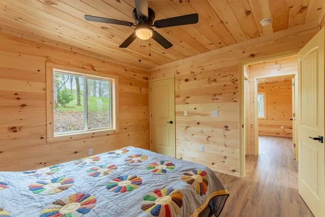a view of a livingroom with wooden floor