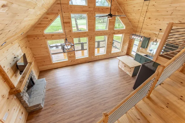 a view of living room with furniture and flat screen tv