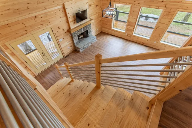 a view of a balcony with wooden floor