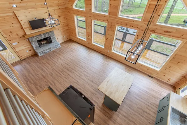 a view of an entryway with wooden floor