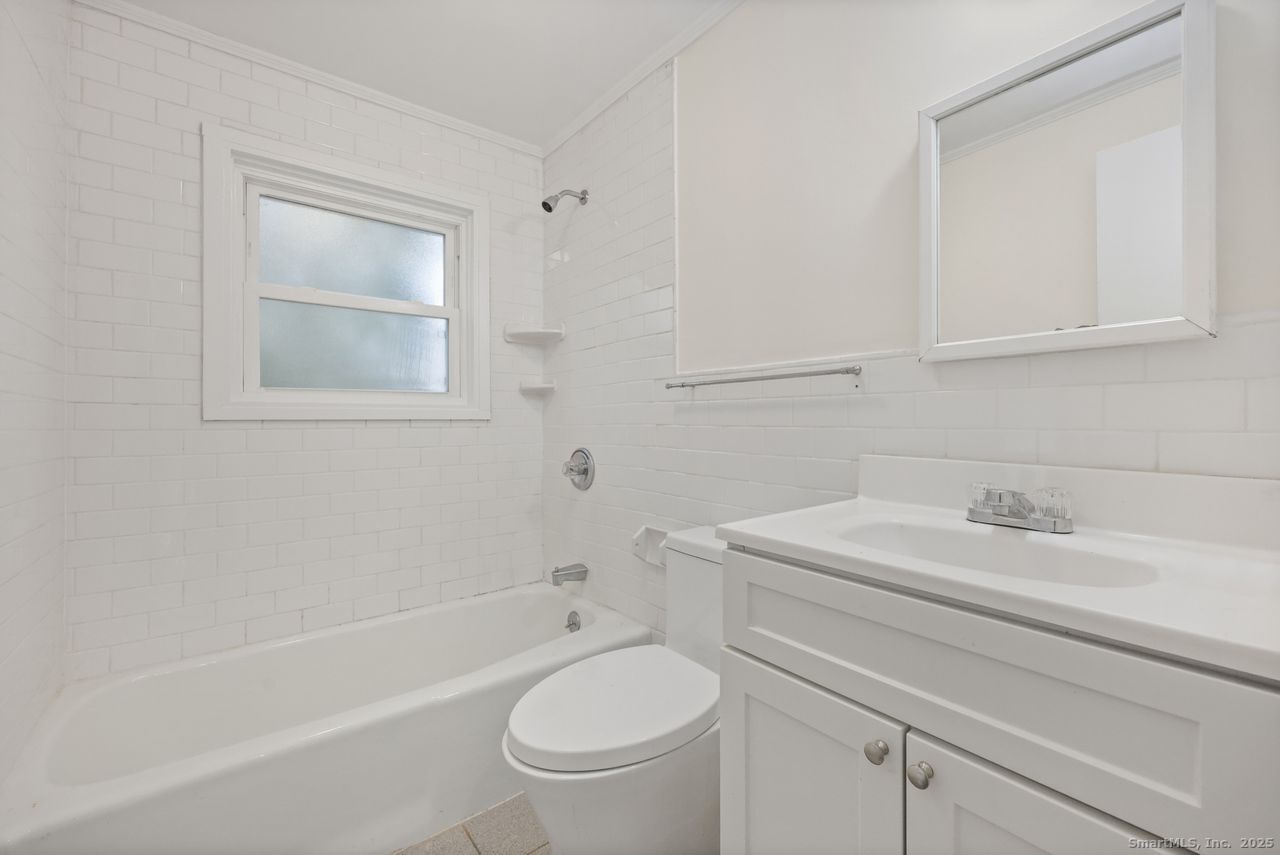 38 Chester Road Easton, CT 06612 - Photo 16 of 36 a bathroom with a sink toilet vanity vanity and bathtub