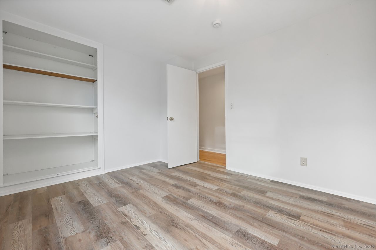 38 Chester Road Easton, CT 06612 - Photo 20 of 36 a view of an empty room with empty racks