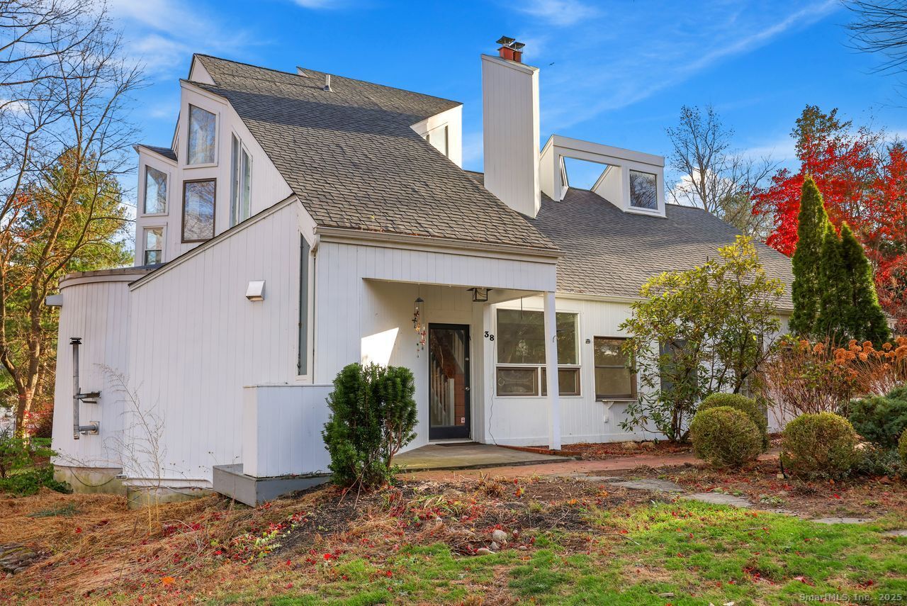 38 Chester Road Easton, CT 06612 - Photo 2 of 36 a view of a house with a yard and potted plants