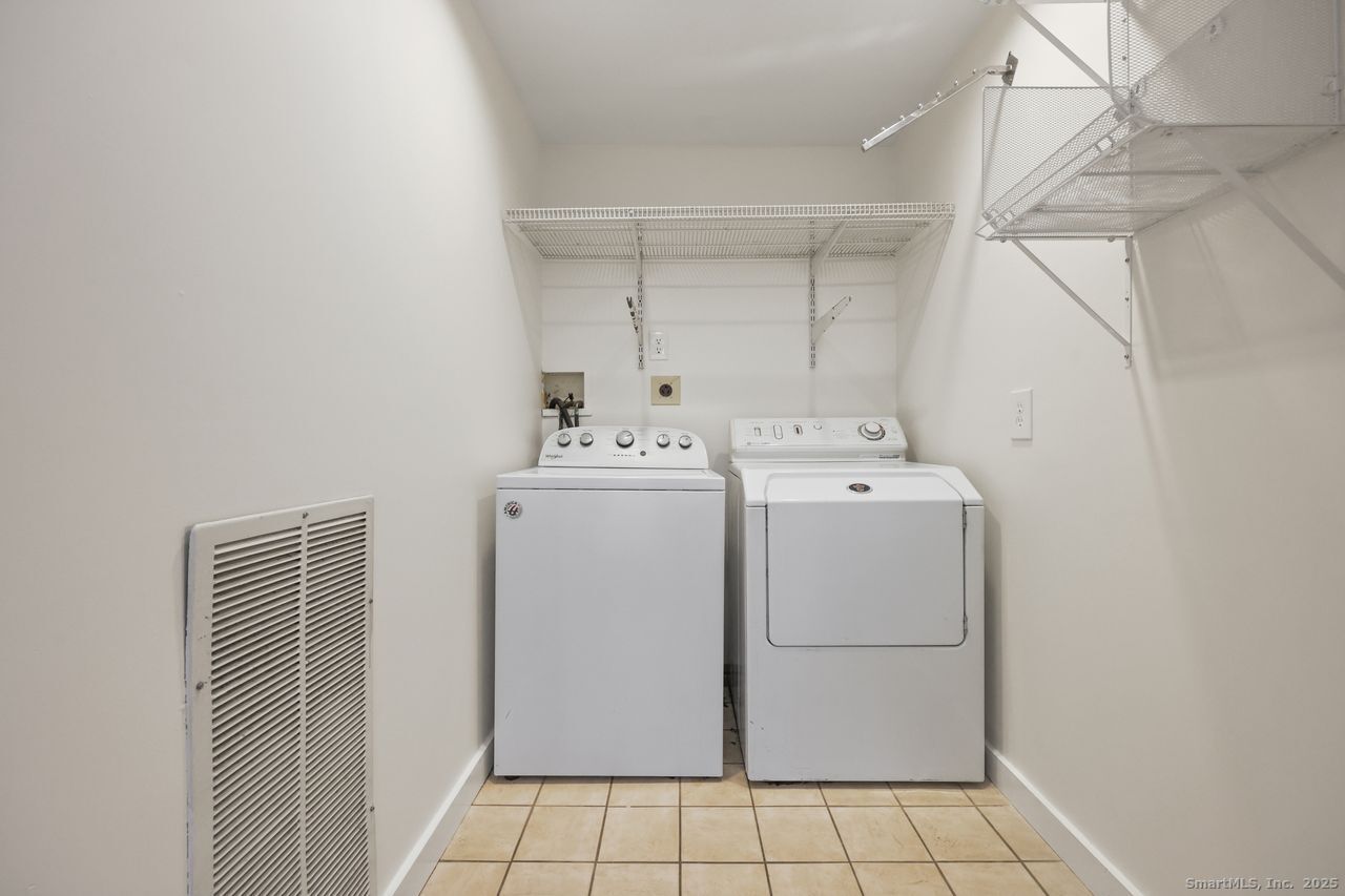 38 Chester Road Easton, CT 06612 - Photo 23 of 36 a utility room with dryer and washer