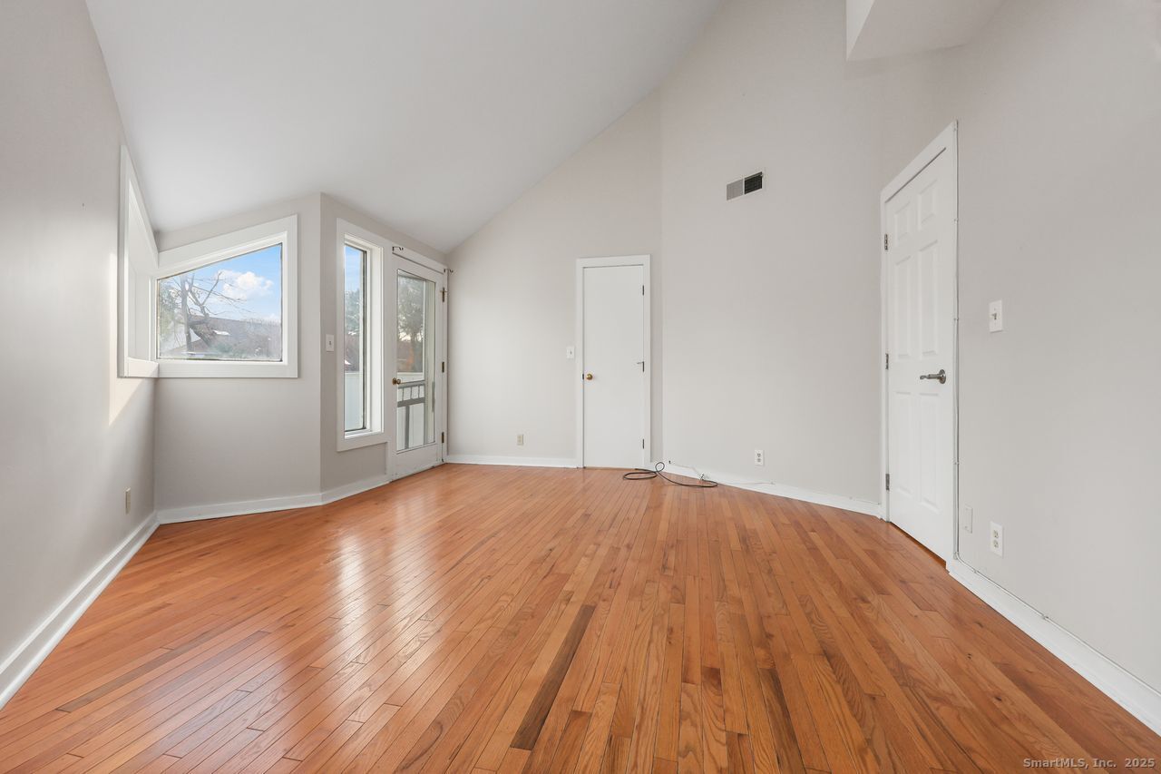 38 Chester Road Easton, CT 06612 - Photo 25 of 36 a view of empty room with wooden floor and fan