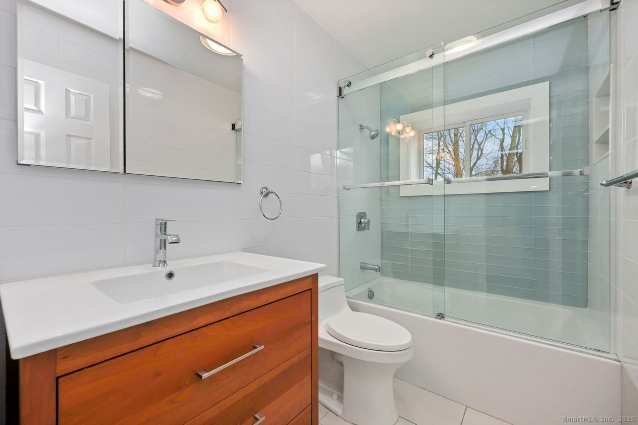 38 Chester Road Easton, CT 06612 - Photo 28 of 36 a bathroom with a sink a toilet and shower