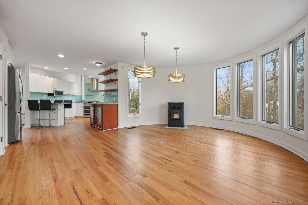 38 Chester Road Easton, CT 06612 - Photo 9 of 36 a view of kitchen with furniture and wooden floor