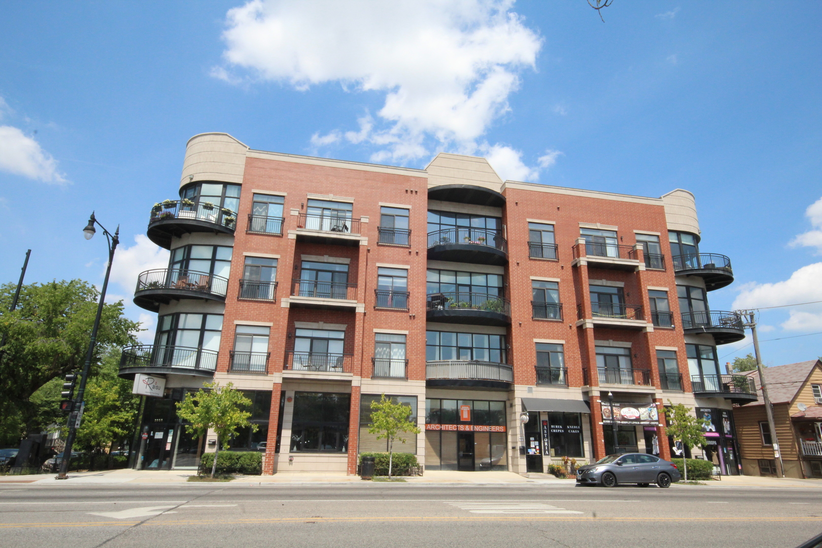 2954 West Irving Park Road, Unit 4C Chicago, IL 60618 - Photo 1 of 44 a front view of a multi story building