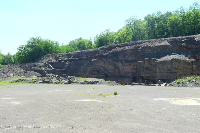 a view of swimming pool with a patio