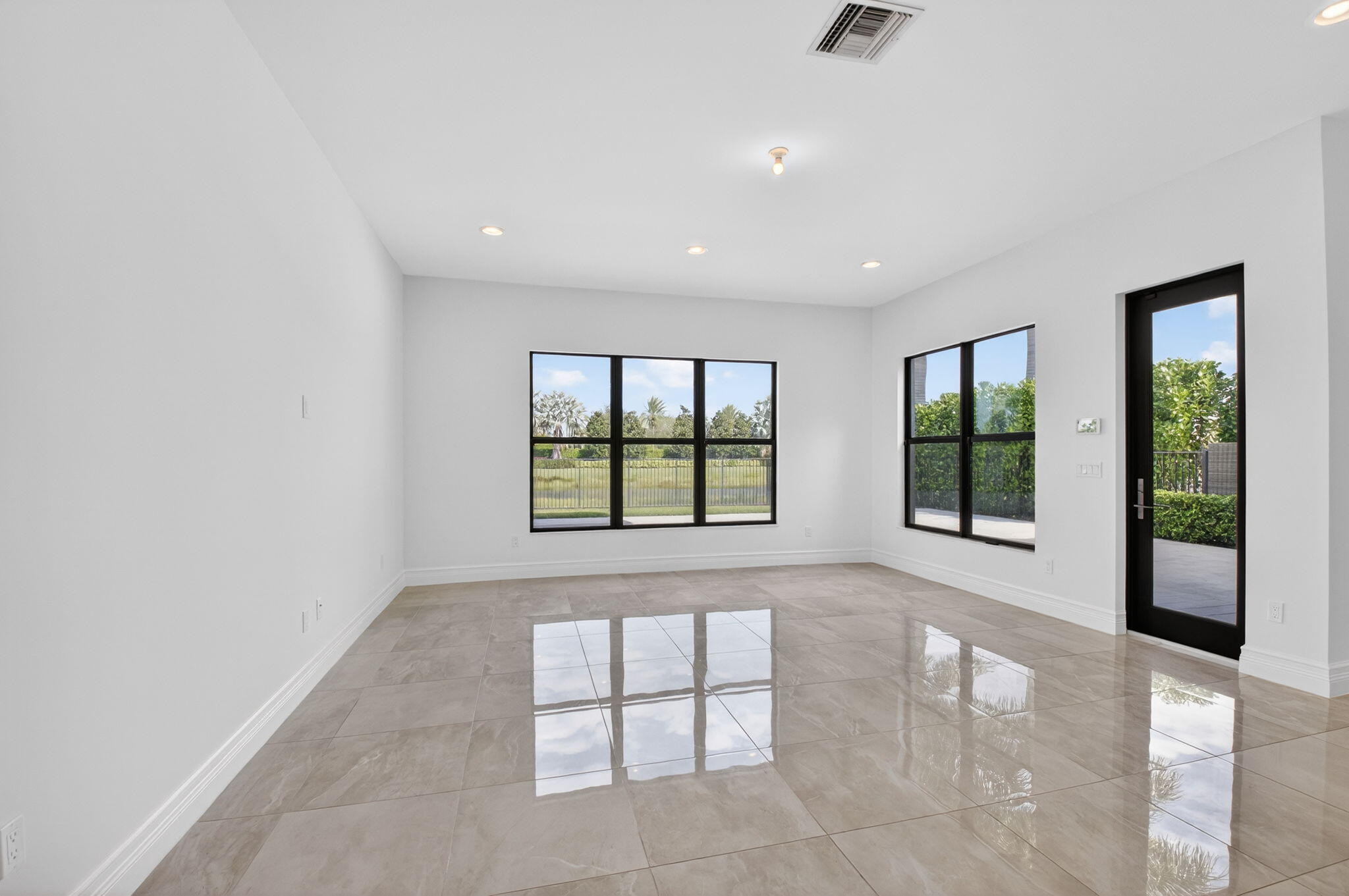 9087 Chauvet Way Boca Raton, FL 33496 - Photo 23 of 78 a view of an empty room with a window