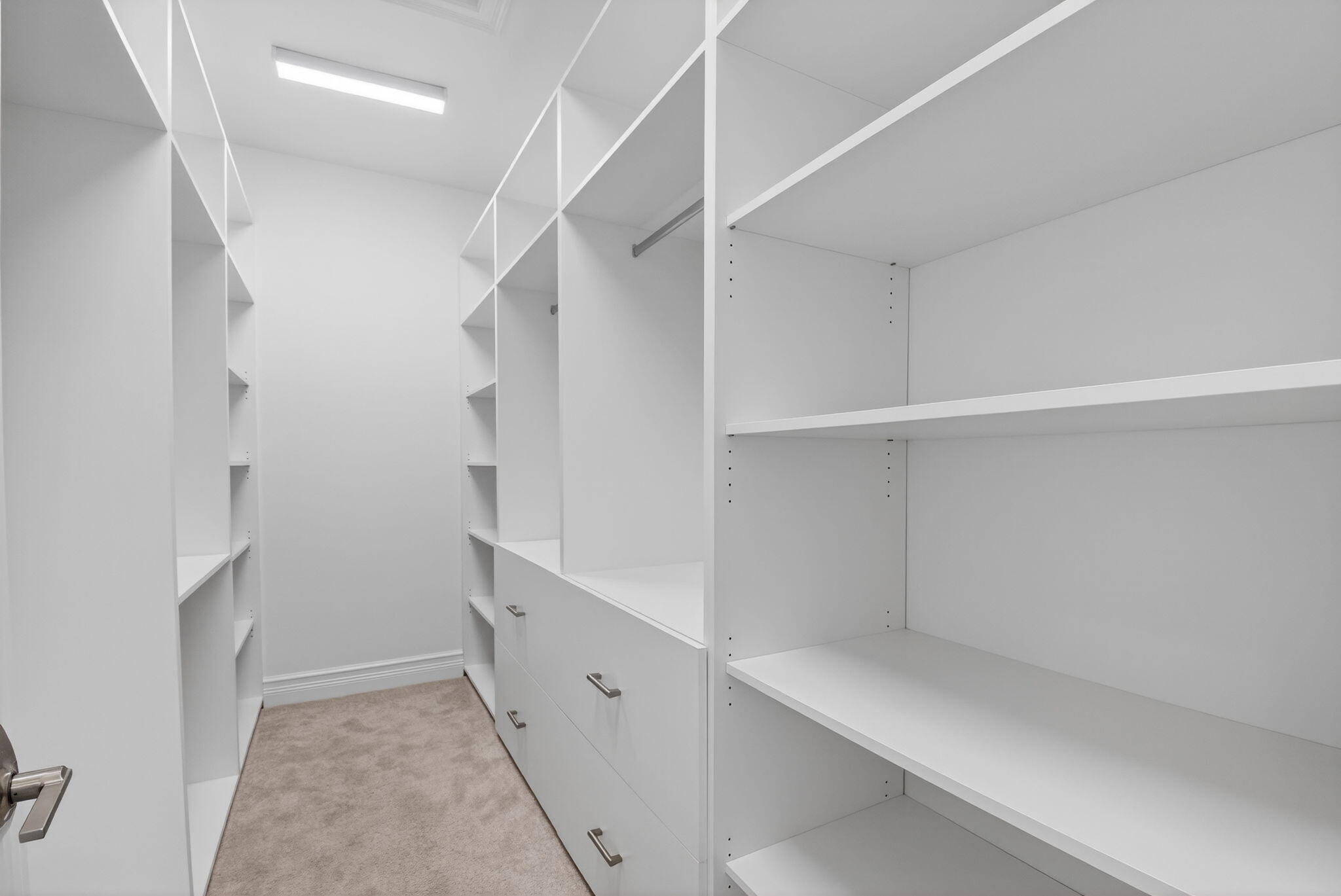 9087 Chauvet Way Boca Raton, FL 33496 - Photo 42 of 78 a view of walk in closet with empty racks