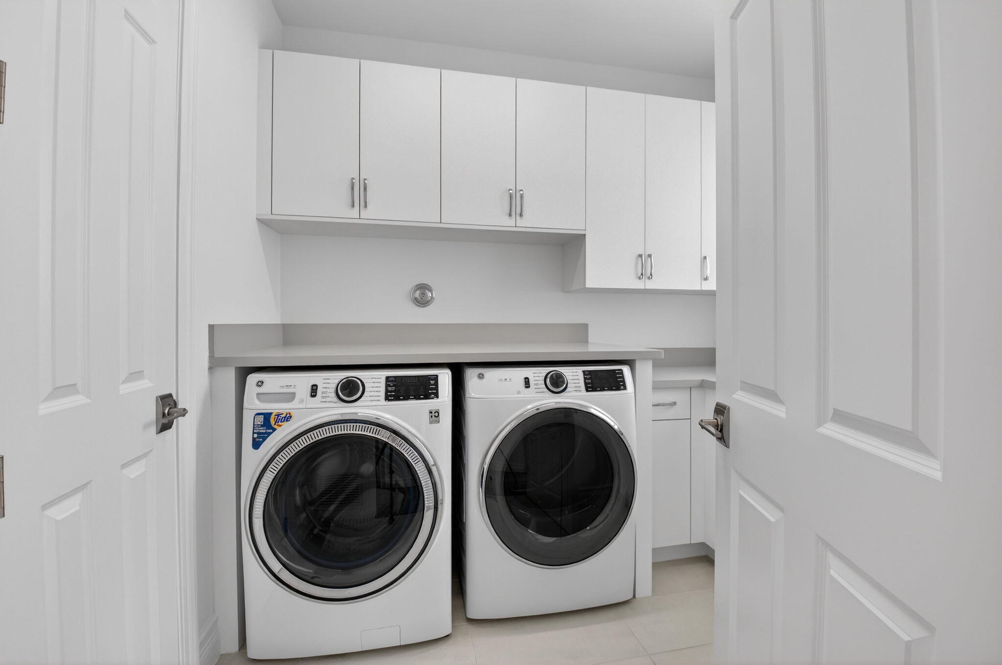 9087 Chauvet Way Boca Raton, FL 33496 - Photo 51 of 78 a utility room with dryer and washer