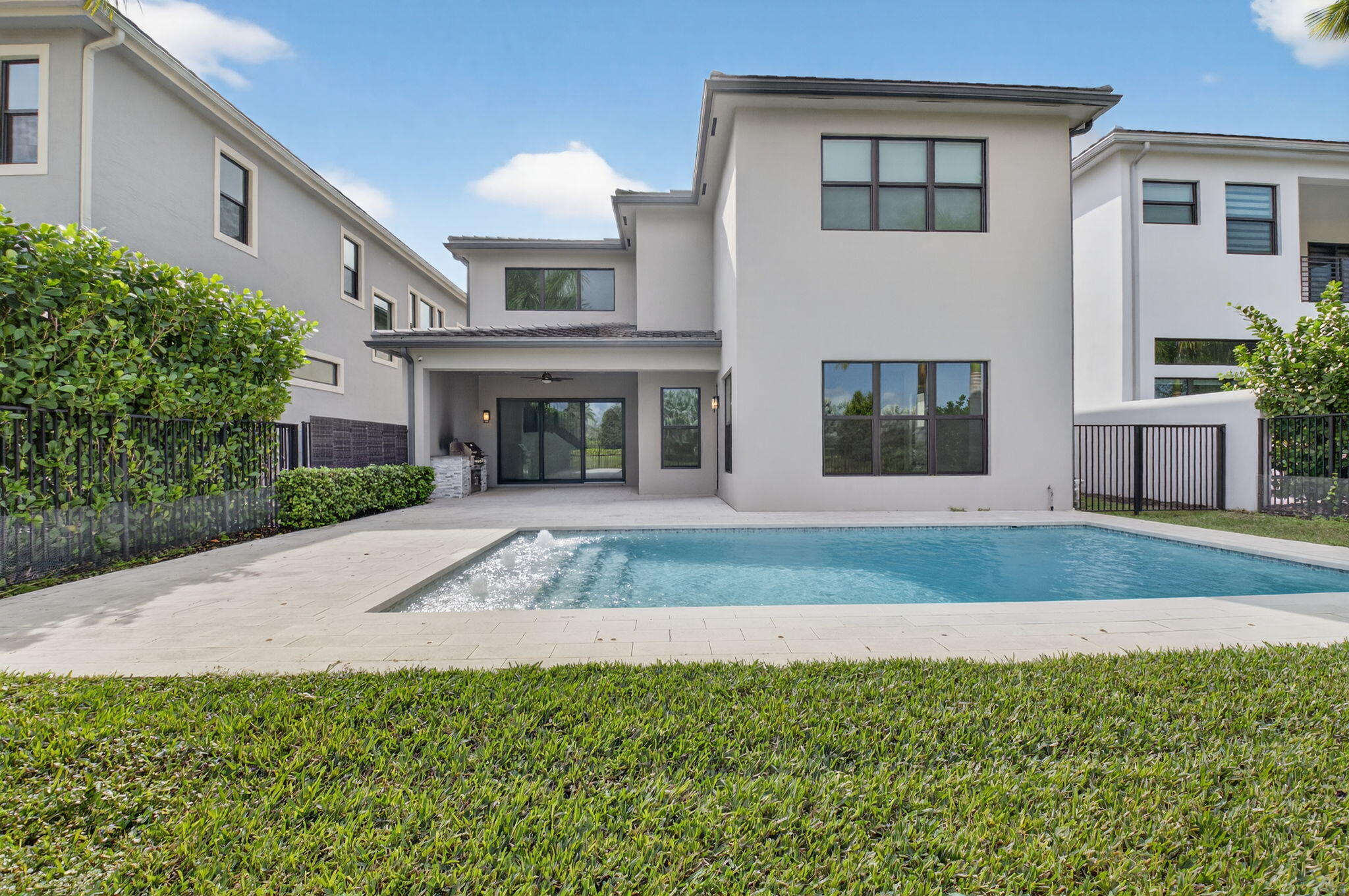 9087 Chauvet Way Boca Raton, FL 33496 - Photo 59 of 78 a house view with a garden space