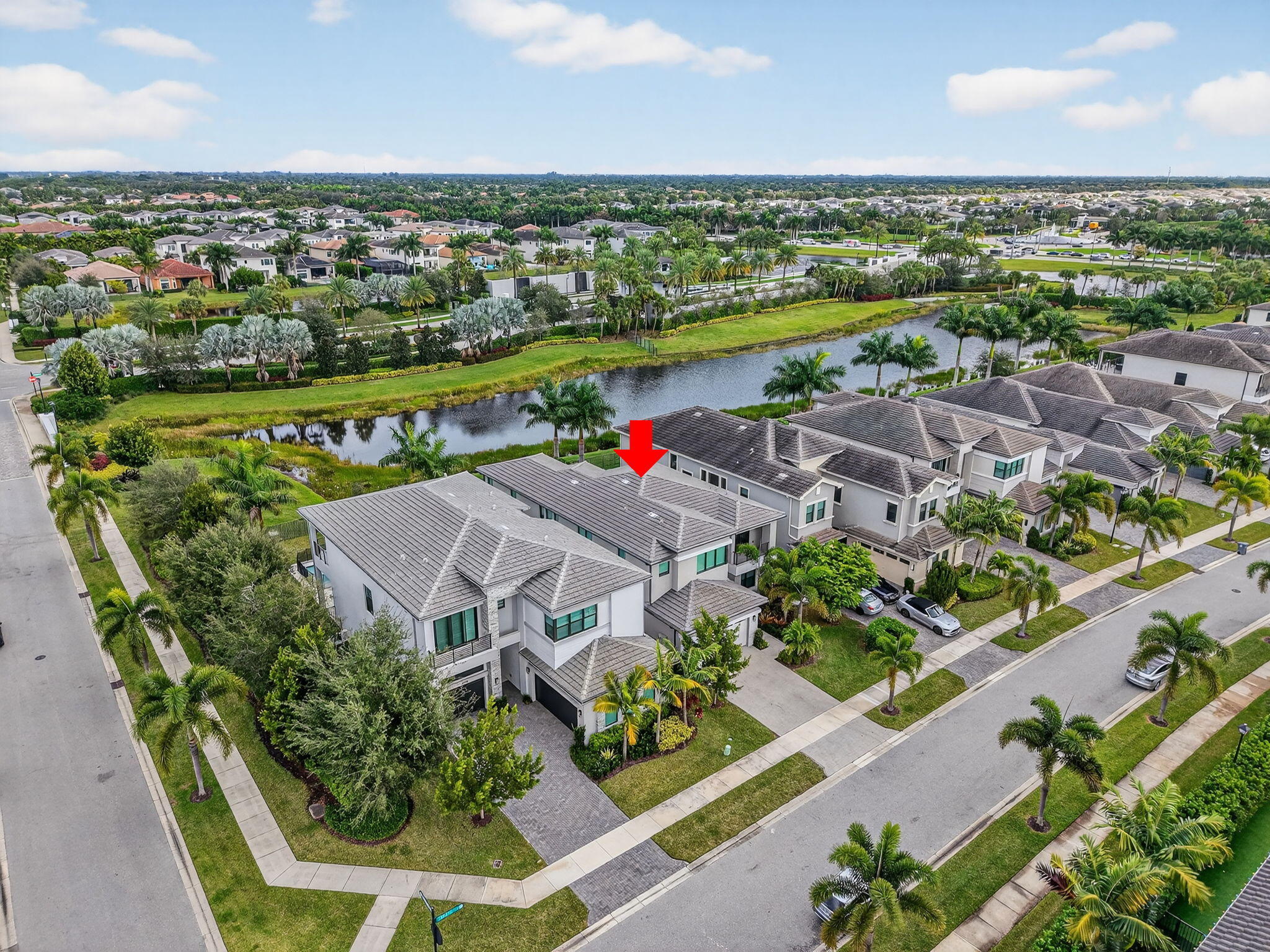 9087 Chauvet Way Boca Raton, FL 33496 - Photo 64 of 78 an aerial view of a city with lots of residential buildings ocean and mountain view in back