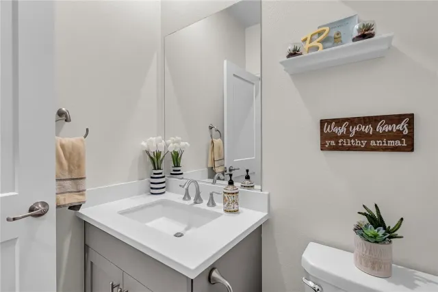 an aerial view of house with a yard