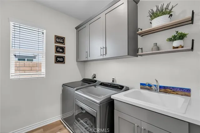 swimming pool view with a seating space