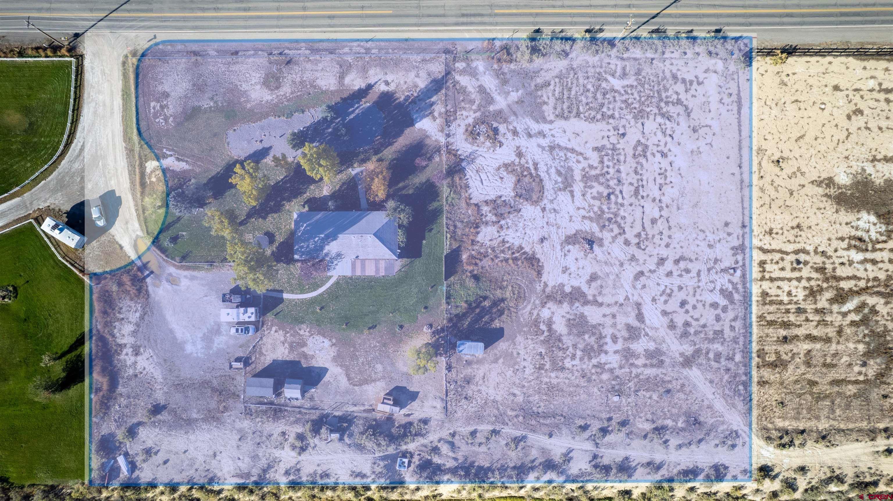 16400 6630 Road Montrose, CO 81401 - Photo 24 of 27 a aerial view of a yard