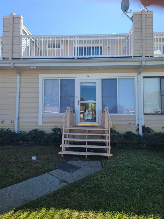 a view of a balcony with a bench