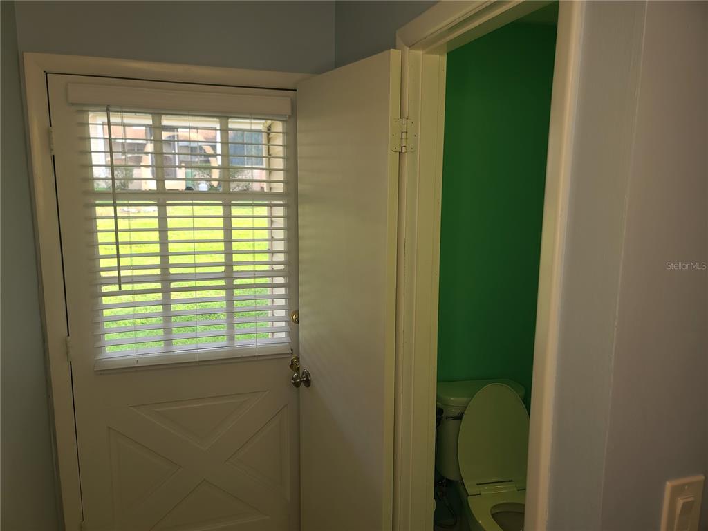 11001 Southeast Sunset Harbor Road, Unit C27 Summerfield, FL 34491 - Photo 18 of 53 a view of a bathroom from a window