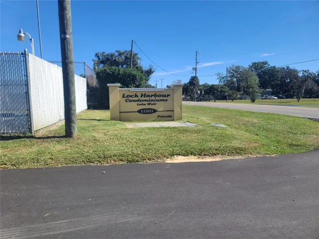 an outdoor space with lounge chair