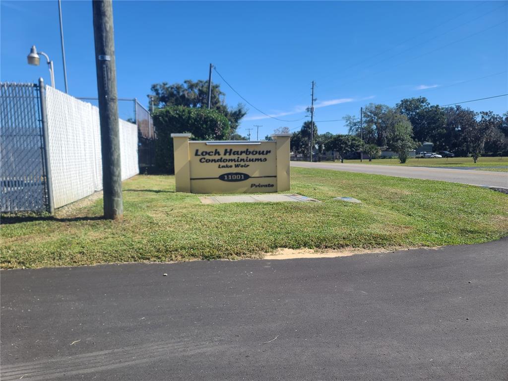 11001 Southeast Sunset Harbor Road, Unit C27 Summerfield, FL 34491 - Photo 45 of 53 a view of a garden