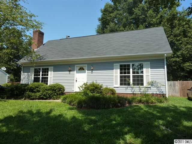 a house view with a garden space