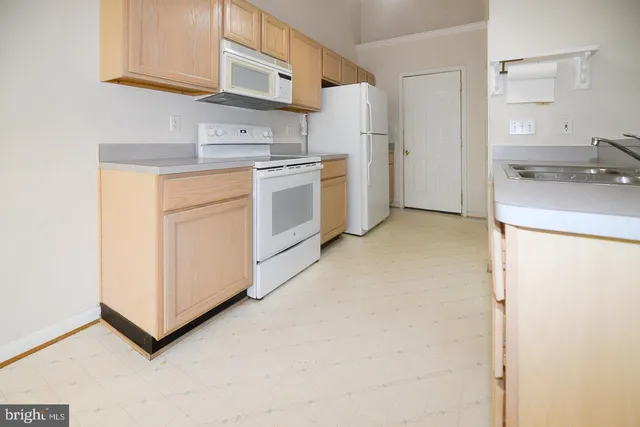 a bathroom with a sink a vanity and a mirror
