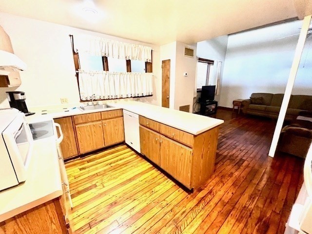 267 Locust Street, Unit 2G Northampton, MA 01062 - Photo 6 of 24 a large bedroom with a bed and a wooden floor