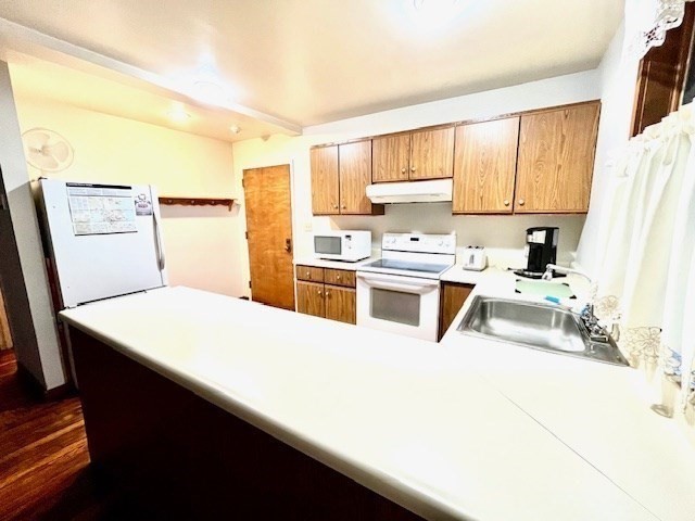 267 Locust Street, Unit 2G Northampton, MA 01062 - Photo 8 of 24 a kitchen with a sink a stove and white cabinets