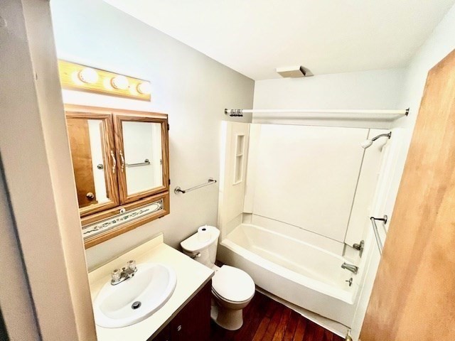 267 Locust Street, Unit 2G Northampton, MA 01062 - Photo 10 of 24 a bathroom with a sink toilet and shower